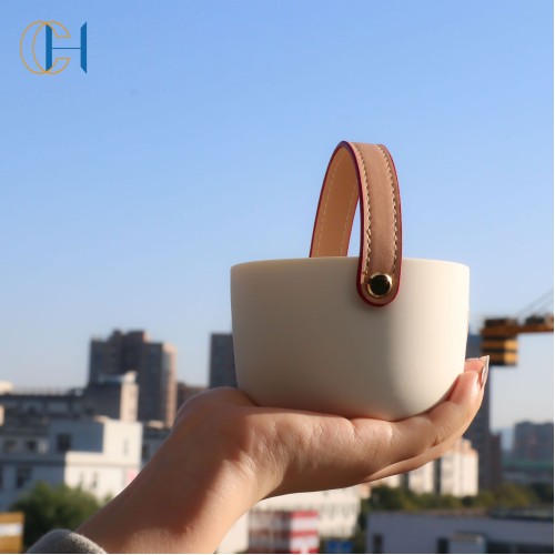 Wholesale New Arrival Luxury Ceramic Unique Design PU Leather Handle Rope Scented Candle Jar with Healing Gemstone Crystal